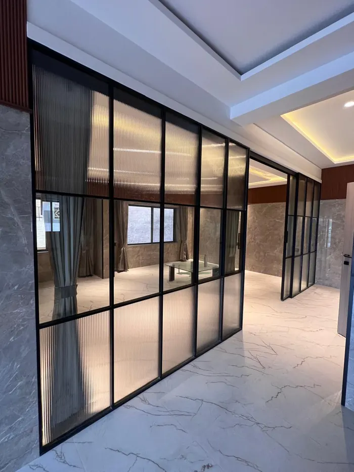 Premium aluminium glass partition fabrication Chennai by Crystal Aluminium Systems