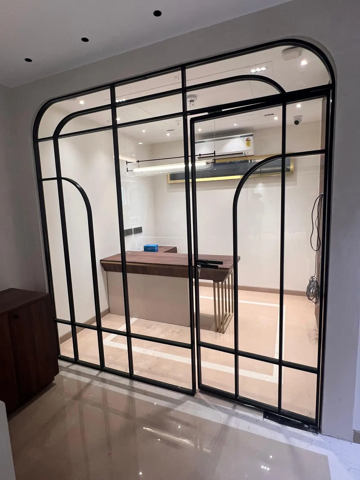 Arched Glass Partition — Anna Nagar